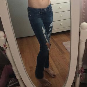 Levi’s 524 Too Super-low dark destroyed jeans 26